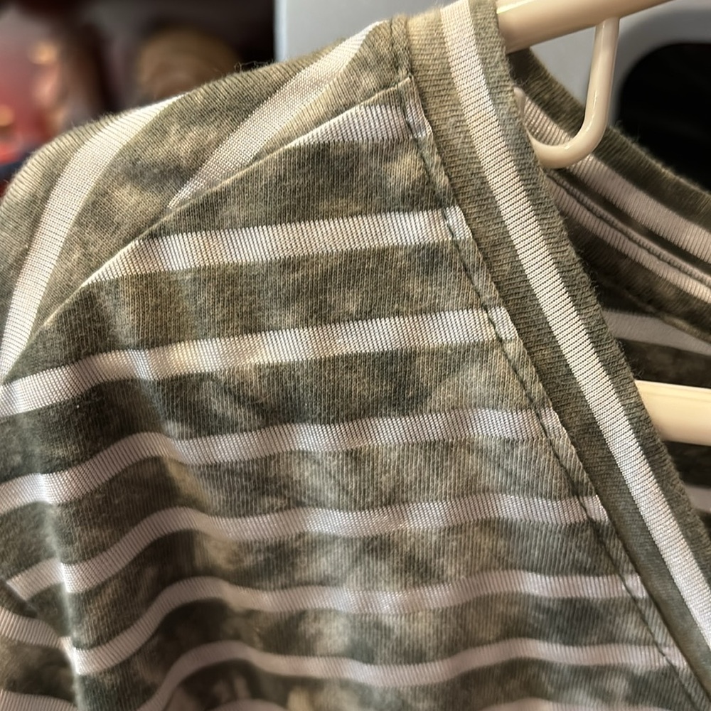 Cute green striped shirt.